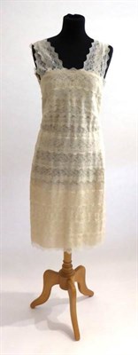 Lot 2122 - Alexander McQueen Cream Lace Bodycon Dress, the cream lace laid in tiers over a nude lining,...