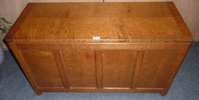 Lot 1659 - A Robert "Mouseman" Thompson Oak Panelled Blanket Box, with higned lid, on four octagonal block...