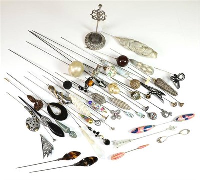 Lot 2172 - Assorted Early 20th Century and Later Hat Pins, including a silver mounted hat pin stand on an...