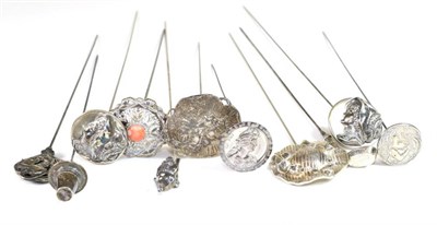 Lot 2175 - Assorted Early 20th Century Silver and Silver Plate Mounted Hat Pins, comprising a pair of embossed