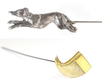 Lot 2187 - A Hat Pin Mounted with a Silver Plated Model of a Racing Greyhound, on a hinge fitting, 7cm by 2cm