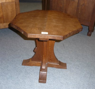 Lot 1667 - A Robert "Mouseman" Thompson Oak Octagonal Coffee Table, on a cruciform base, with carved mouse...