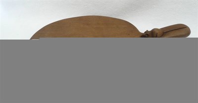 Lot 1670 - A Robert "Mouseman" Thompson Oak Cheese Board, with carved mouse signature to the handle, 39.5cm