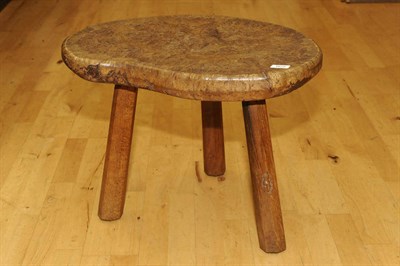 Lot 1672 - A Robert "Mouseman" Thompson Burr Oak Kidney Stool/Occasional Table, with three tapering...