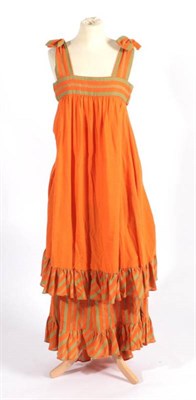 Lot 2245 - A 1970s Gina Fratini Orange Cotton Two Piece Dress and Underskirt, with green striped frill to...