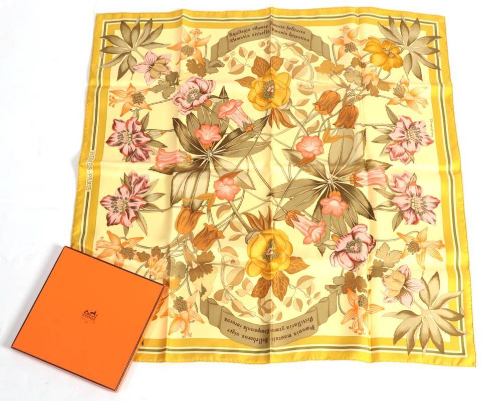 Lot 2257 - Hermès ''Fleurs d'Hellade'' Silk Scarf, by Niki Goulandris, printed with a design of flowers...