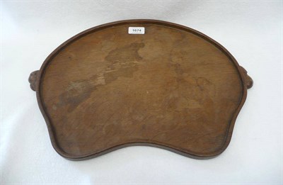 Lot 1674 - A Robert "Mouseman" Thompson Oak Kidney Tea Tray, with two mice handles, 48cm across