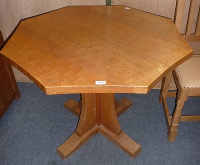 Lot 1689 - A Robert "Mouseman" Thompson Oak Octagonal Table, on cruciform base with carved mouse...