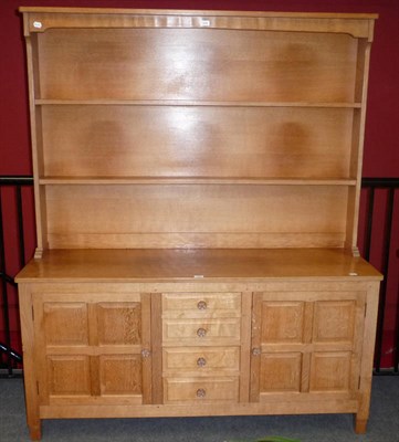 Lot 1699 - A Colin "Beaverman" Almack Oak Dresser, the rack with two plate shelves, the base with two panelled