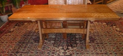 Lot 1701 - A Colin "Beaverman" Almack Oak 6' Refectory Table, on two shaped supports joined by a stretcher, on