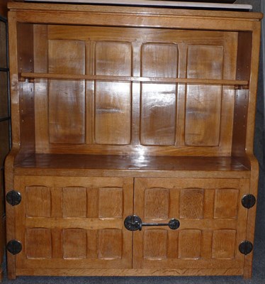 Lot 1710 - A Sid Pollard Oak Open Bookcase, the top section with an adjustable shelf, above two cupboard doors