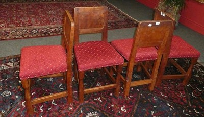 Lot 1726 - A Set of Eight (6+2) Thomas "Gnomeman" Whittaker Oak Chairs,  upholstered red and cream seats,...