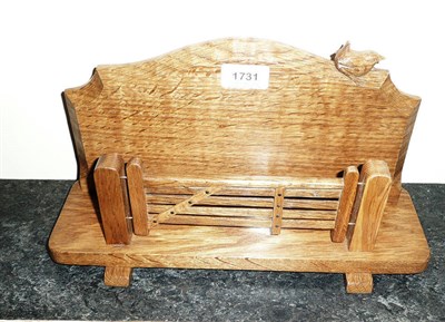 Lot 1731 - A Bob Hunter Wren Cabinet Makers English Oak Gate Letter Rack, shaped back with gate and posts...