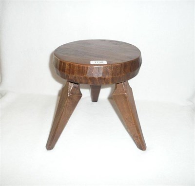 Lot 1748 - An Arts and Crafts Oak Cow Stool, by Jack Grimble of Cromer, the seat with tooled rim, on three...