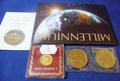 Lot 187 - Sovereign 1915, trivial contact marks, in a plastic case GVF; and 4 x £5 coins, 1999, 2000...