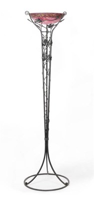 Lot 1753 - A Schneider Pink Mottled Glass and Wrought-Iron Floor Lamp, the shade etched "SCHNEIDER", 35cm...