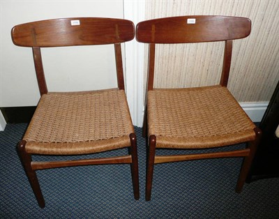 Lot 1759 - A Pair of Teak and Oak Chairs, designed by Hans J Wegner for Carl Hansen & Son, Odense,...