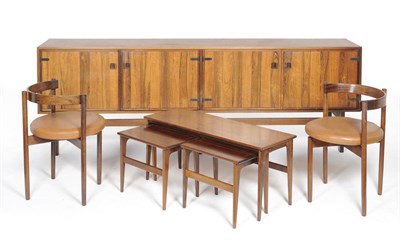 Lot 1760 - A 1960's Danish Rosewood Dining Room Suite, comprising extending dining table (with two leaves)...