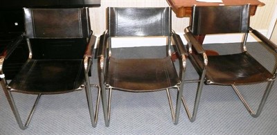 Lot 1774 - Three Chromed Tubular Steel Armchairs, black leather seats, backs and armrests, unmarked, 78cm