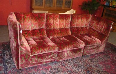 Lot 1775 - A B & B Italia Three Section Sofa, upholstered in red and green abstract pattern velour,...