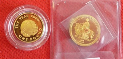 Lot 186 - Guernsey: Gold £1 2000, rev. hands holding a globe, 7.39g, in capsule FDC; and a 24ct Gold...