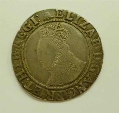 Lot 16 - Elizabeth I Shilling, 6th issue, MM bell, ear concealed (bust 3B); full, round flan with well...