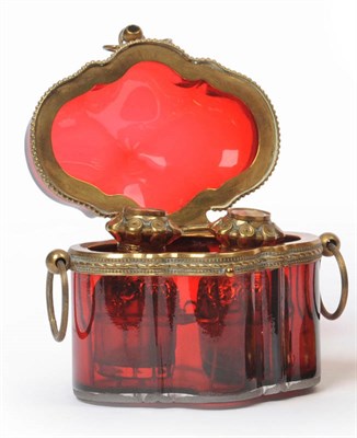 Lot 7 - A French Ruby Glass Scent Casket, circa 1860, of quatrelobed oval form with gilt metal mounts...