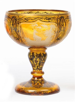 Lot 10 - A Bohemian Amber Flash Glass Pedestal Bowl, circa 1850-70,  the circular bowl with four arched...