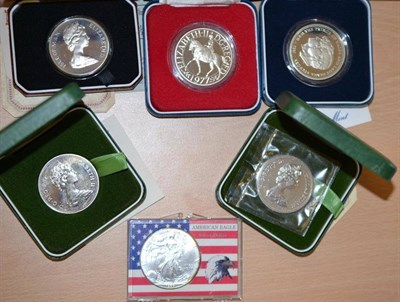 Lot 67 - 8 x Silver Proof Crowns:  1972(x3), 1977, 1981 & Isle of Man 1976 & 1977(x2) together with Falkland