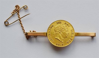 Lot 116 - A Gold Tie-Pin Fashioned from a George III Half Sovereign 1817 mounted on a 9ct gold pin &...