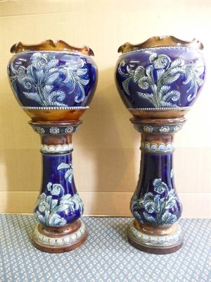 Lot 36 - A Pair of Doulton Lambeth Stoneware Jardinieres on Stands, circa 1900, each blue glazed...