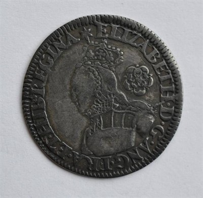 Lot 252 - Elizabeth I Milled Sixpence 1562 MM star, tall narrow bust with plain dress, large rose; faint...