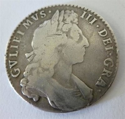 Lot 110 - William III Halfcrown 1697 NONO, 1st bust, large shields, rev. scratches across Scottish...