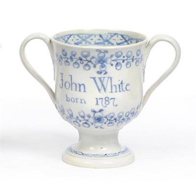 Lot 99 - A Swinton Pearlware Pottery Loving Cup, John White Born 1787, the strap handles with leaf...