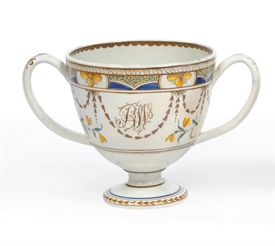 Lot 100 - A Swinton Pearlware Pottery Loving Cup, circa 1790, painted with a rim band of yellow...