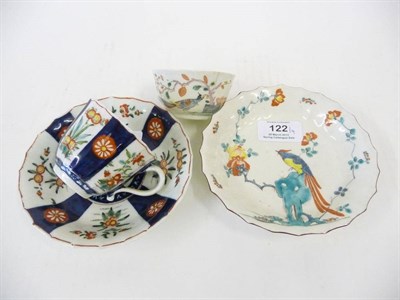 Lot 122 - A Worcester Tea Bowl, circa 1753, thinly potted and enamelled with two long-tailed birds...