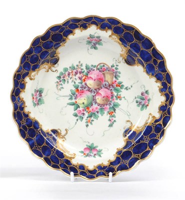 Lot 128 - A Worcester Dessert Plate, circa 1780, the blue ground with cailloute gilding around a spotted...