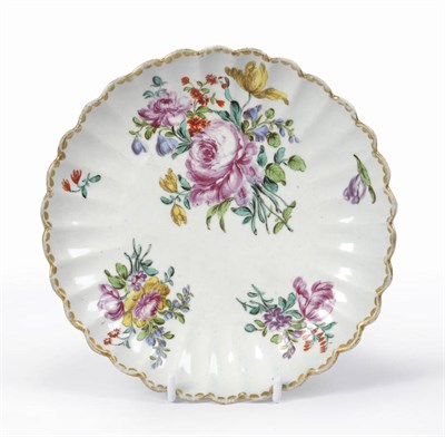 Lot 135 - A Bow Fluted Saucer Dish, circa 1765, brightly enamelled with five Meissen style sprays and...