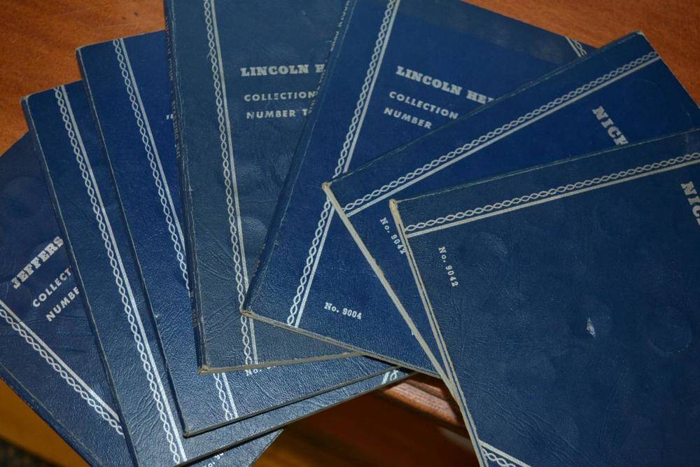 Lot 223 - USA, 77 x 'Mercury' dimes, various dates 1916-1945 in 2 x Whitman folders, 150 x 'Jefferson'...