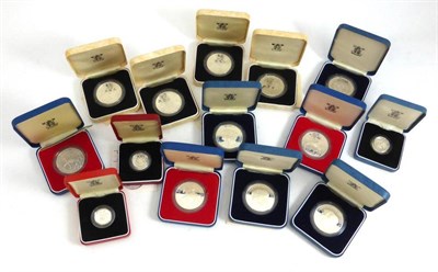 Lot 214 - 11 x UK Silver Proof Crowns comprising: 1977(x3), 1980(x4) & 1981(x4), with certs, in CofI,...