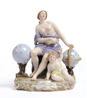 Lot 184 - A Naples Porcelain Figure of Astromania, 19th century, the semi-nude female figure seated on...