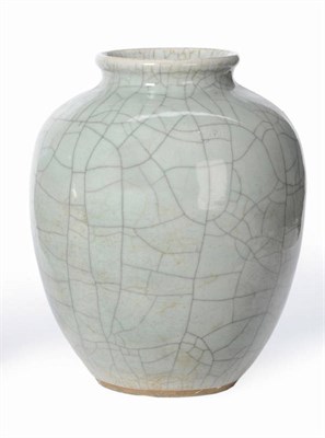 Lot 189 - A Chinese Porcelain Guan Style Vase, late 19th century, of ovoid shape, with uniform crazed...