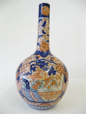 Lot 191 - A Japanese Imari Bottle Vase, late Meiji period (1868-1912), decorated in typical colours with...