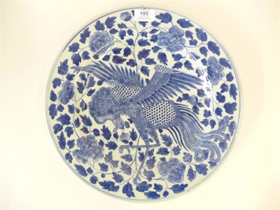 Lot 195 - A Chinese Blue and White Porcelain Shallow Circular Dish, circa 1850, painted with a large...