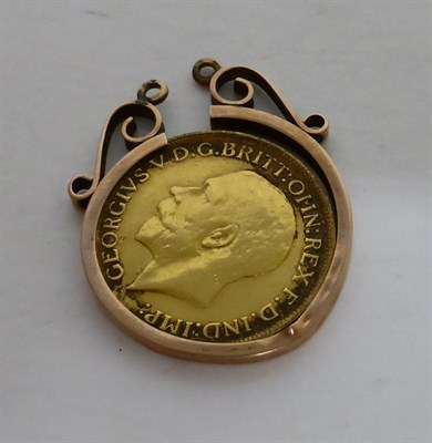 Lot 14 - Sovereign 1912, loose in 9ct gold ringmount, gross weight 9.6g, Fine