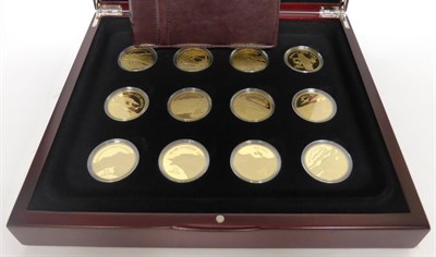 Lot 70 - Solomon Islands, A Set of 12 x .999 Silver Gilt Crowns 2005 'History of Powered Flight' each...