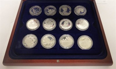 Lot 86 - A Set of 18 x Silver Crowns 2002 'Queen Mother Memorial,' various Commonwealth countries, all...