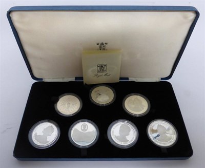 Lot 101 - 2 x Commemorative Sets comprising: (1) a set of 8 x sterling silver proof crowns, Silver...