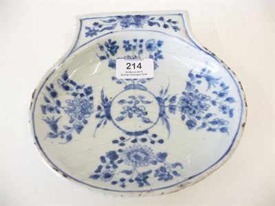 Lot 214 - A Chinese Blue and White Export Porcelain Scallop Shaped Dish, Kangxi (1662-1722), painted with...