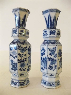 Lot 216 - A Pair of Chinese Blue and White Export Porcelain Hexagonal Panelled Vases, Kangxi (1662-1722),...